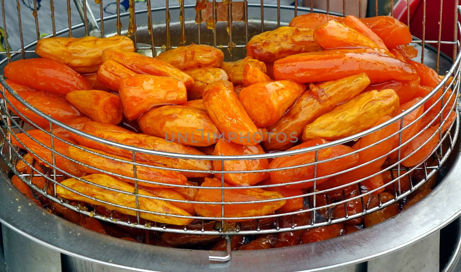 Baked sweet potatoes glazed with sugar are a popular Chinese snack