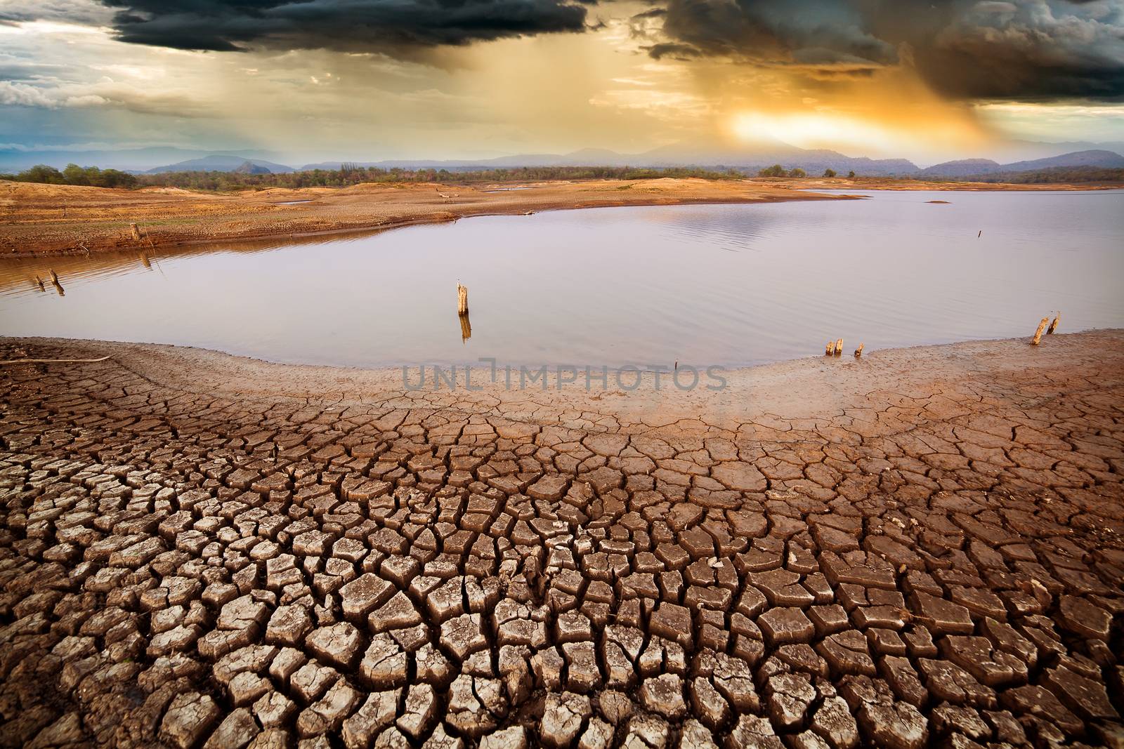 thunder storm sky Rain clouds Cracked dry land without wate by freedomnaruk