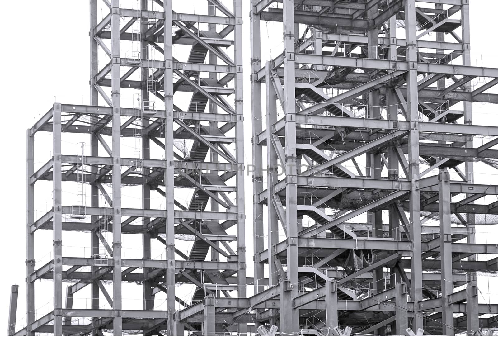 Monochrome image of a large steel structure for a construction project
