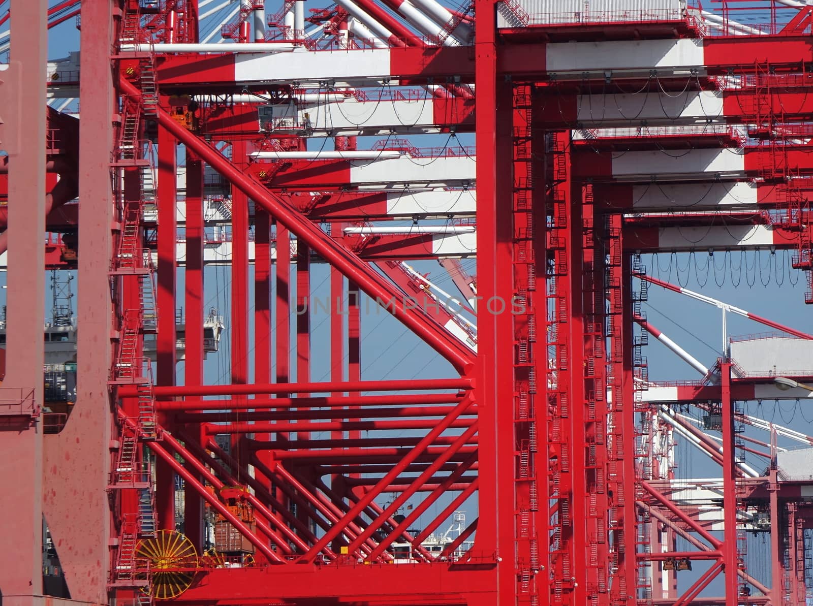 A row of large cranes used for loading containers on to ships