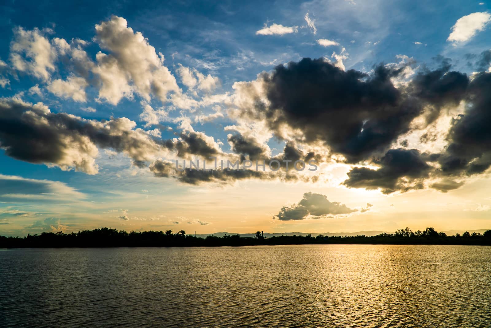 colorful dramatic sky with cloud at sunset