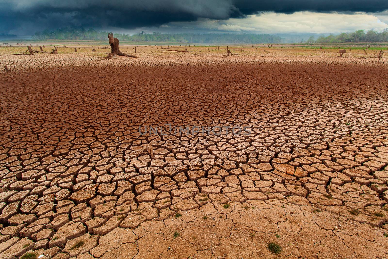 thunder storm sky Rain clouds Cracked dry land without wate