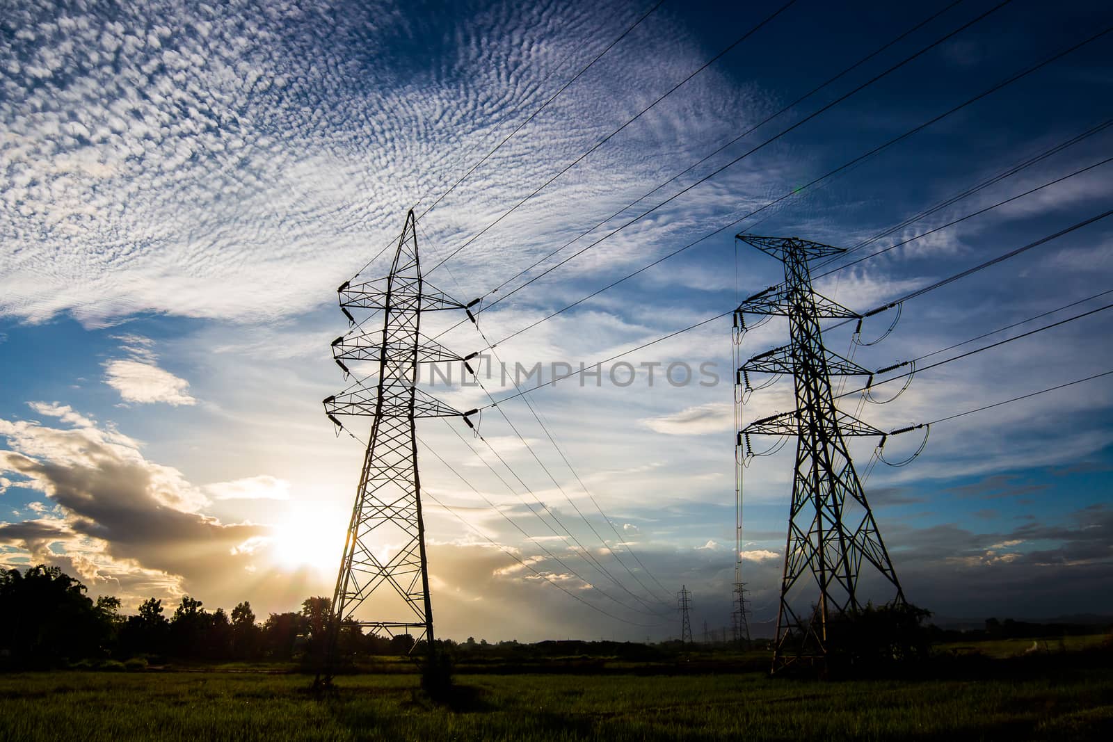 silhouette of high voltage electrical pole structure by freedomnaruk