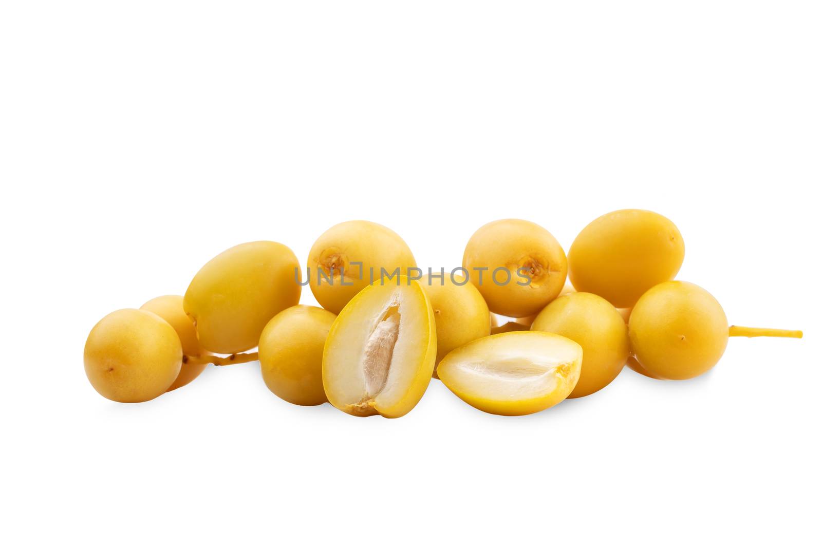 yellow date palm fruit on white background  by freedomnaruk