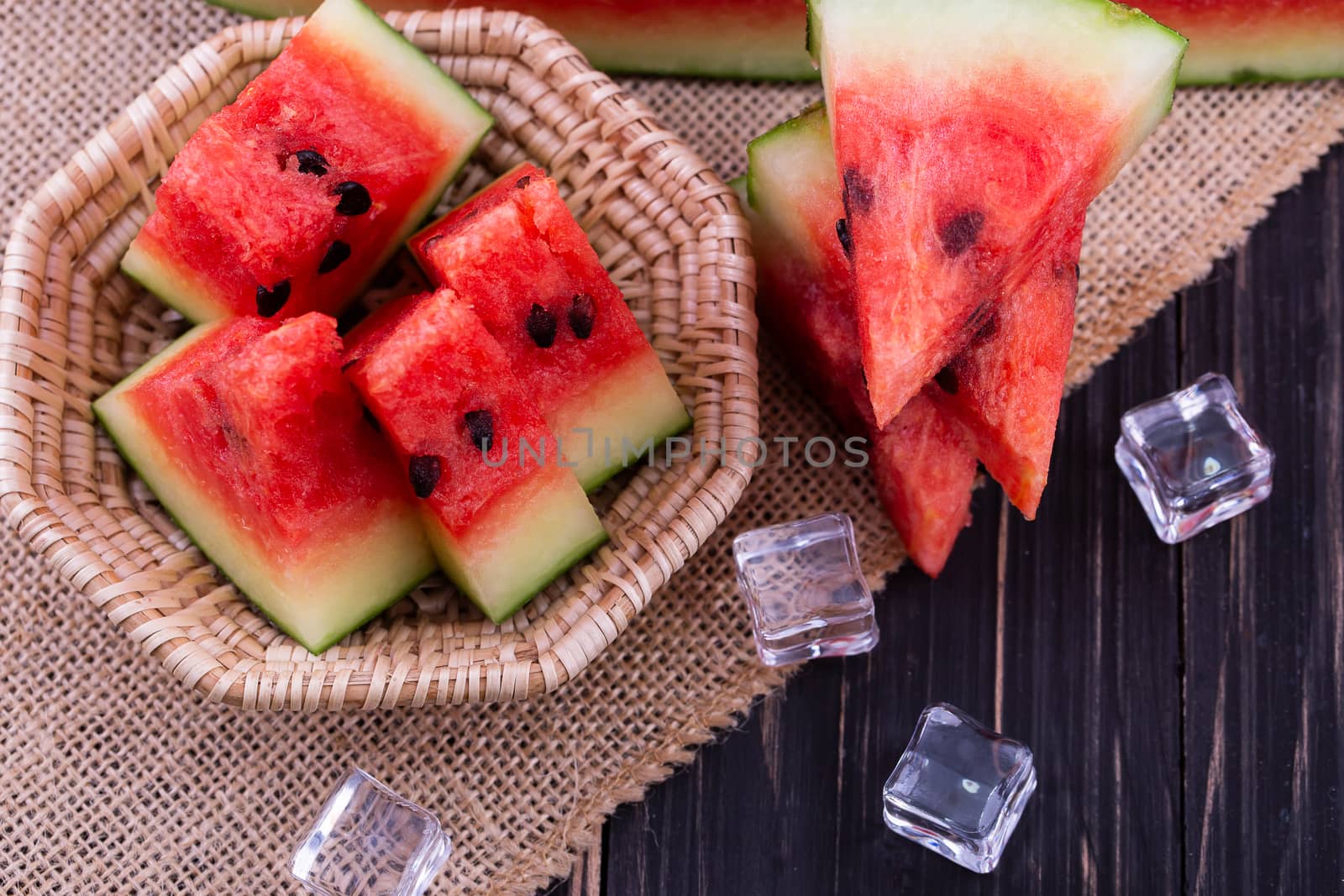 watermelon on wooden background by freedomnaruk