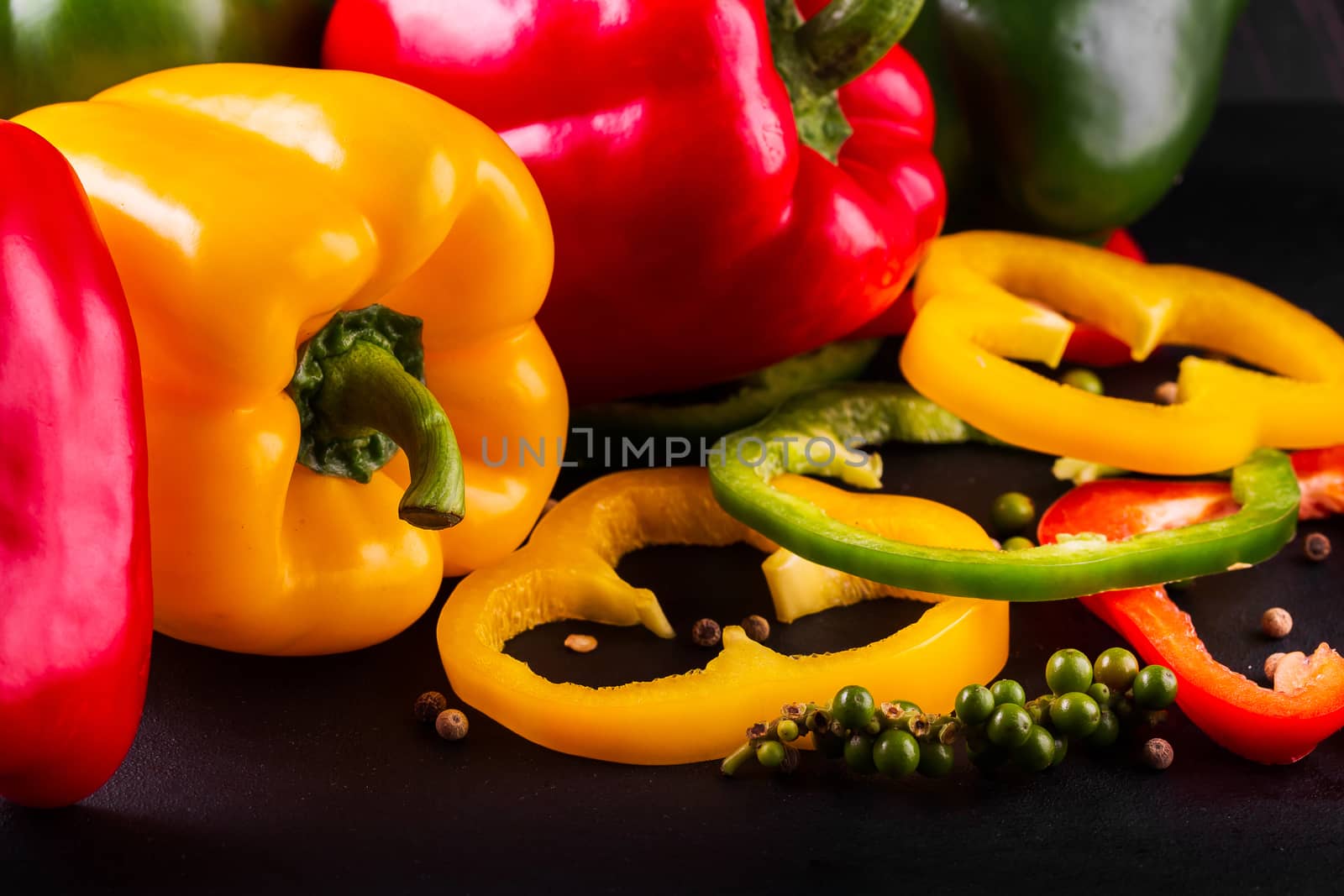 Three sweet peppers on a wooden background, Cooking vegetable sa by freedomnaruk
