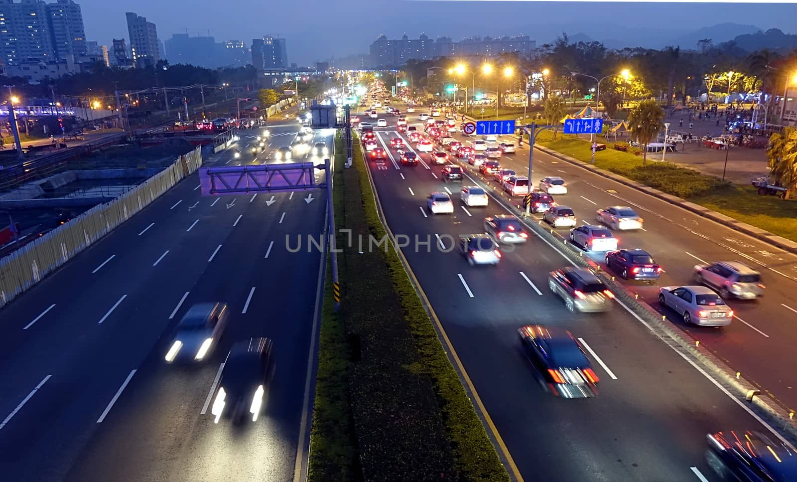 Dense traffic at evening rush hour on a main street in Kaohsiung, Taiwan
