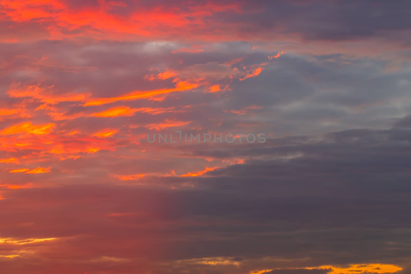 colorful dramatic sky with cloud at sunset
 by freedomnaruk
