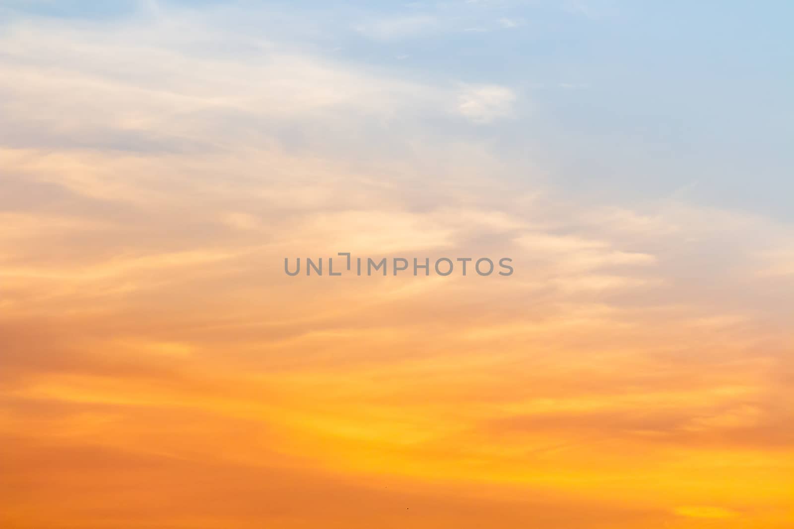 colorful dramatic sky with cloud at sunset