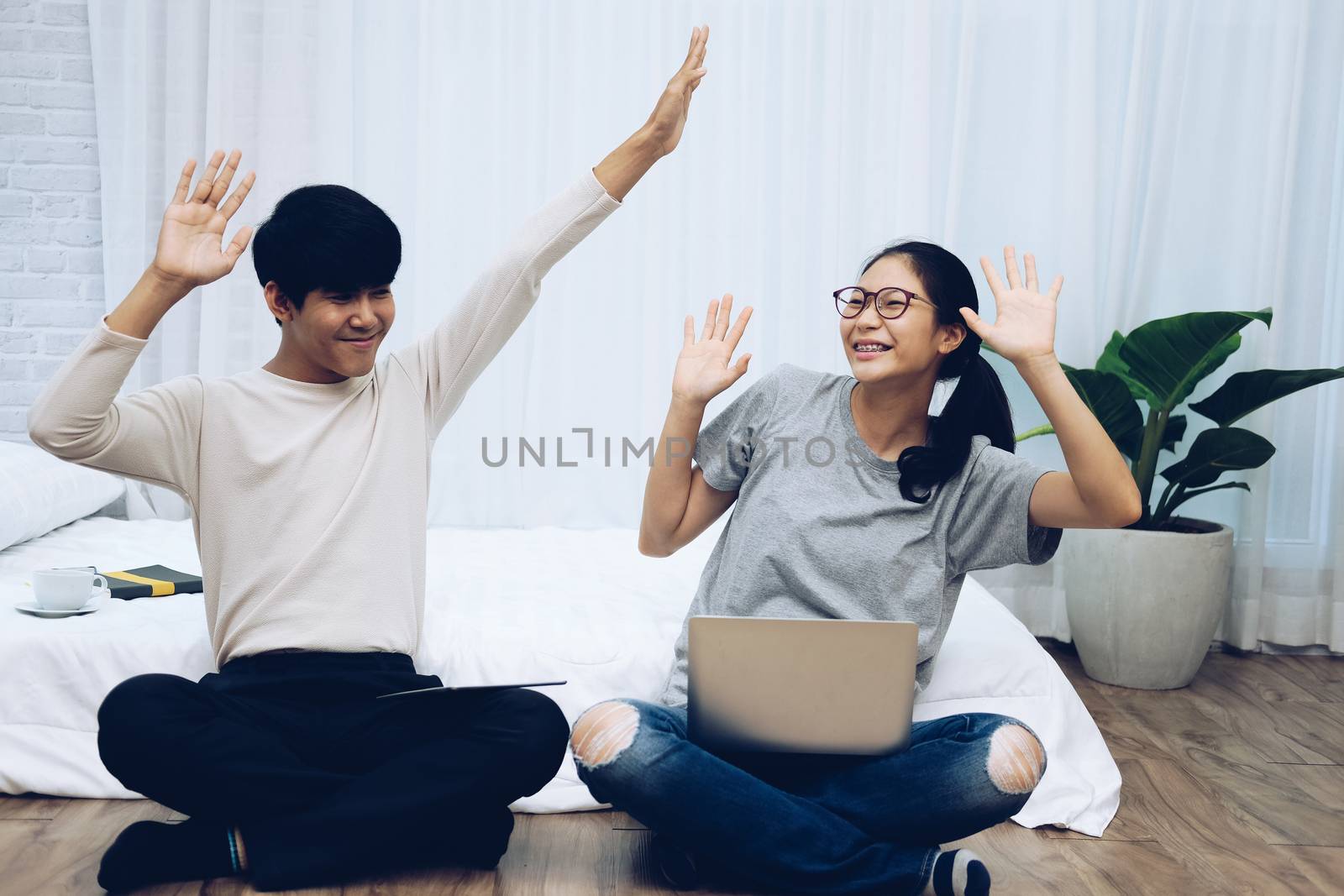 man woman friends using computer tablet. startup teamwork team feeling glad happy