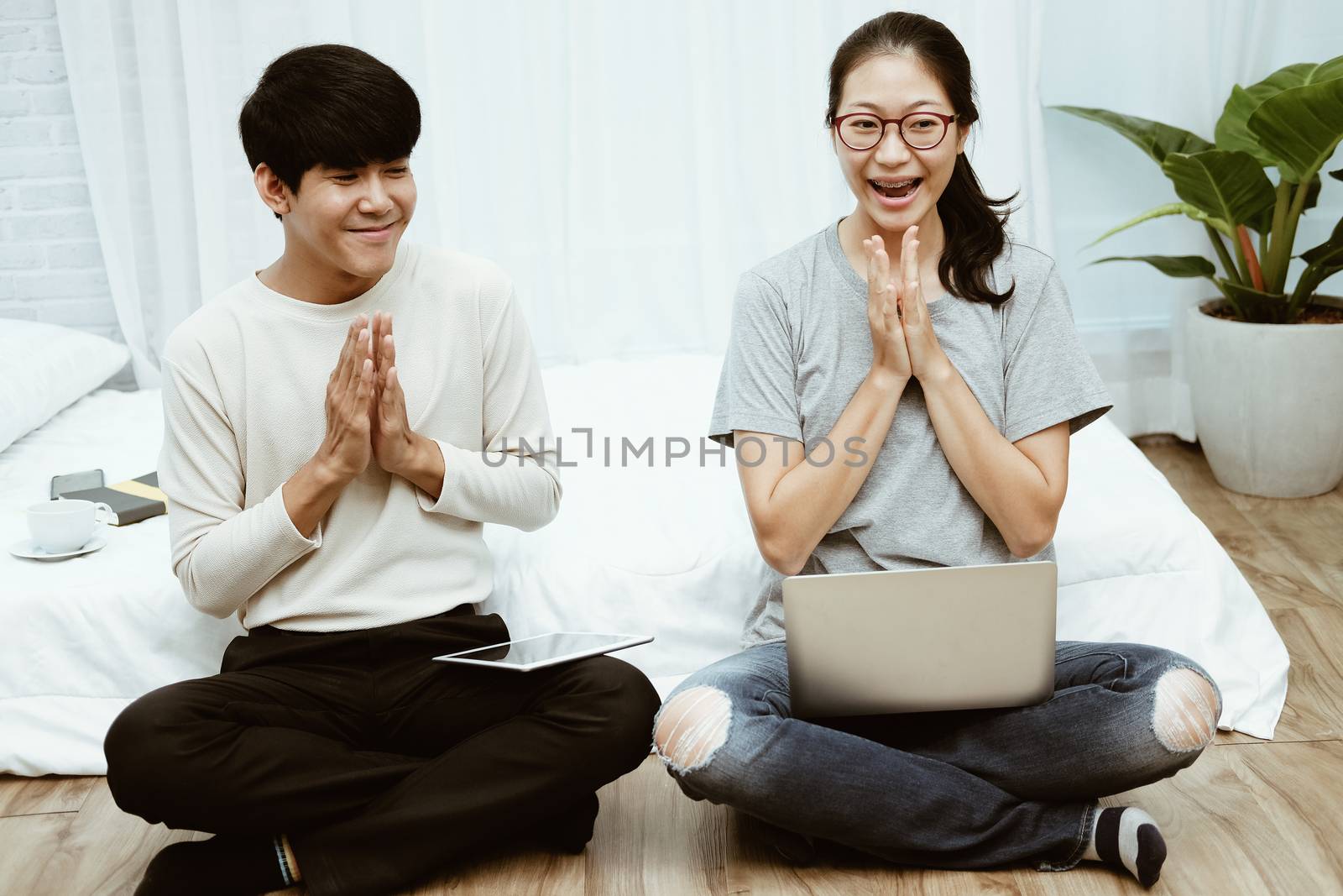 man woman friends using computer tablet. startup teamwork team feeling glad happy