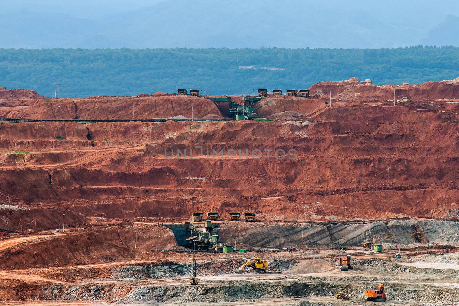 Part of a pit with big mining truck working