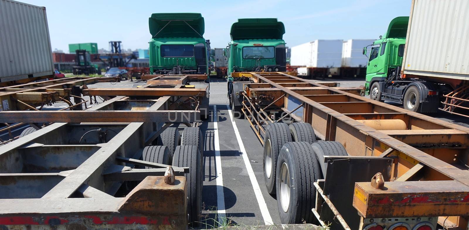 Large container trailer chassis used for transporting shipping containers