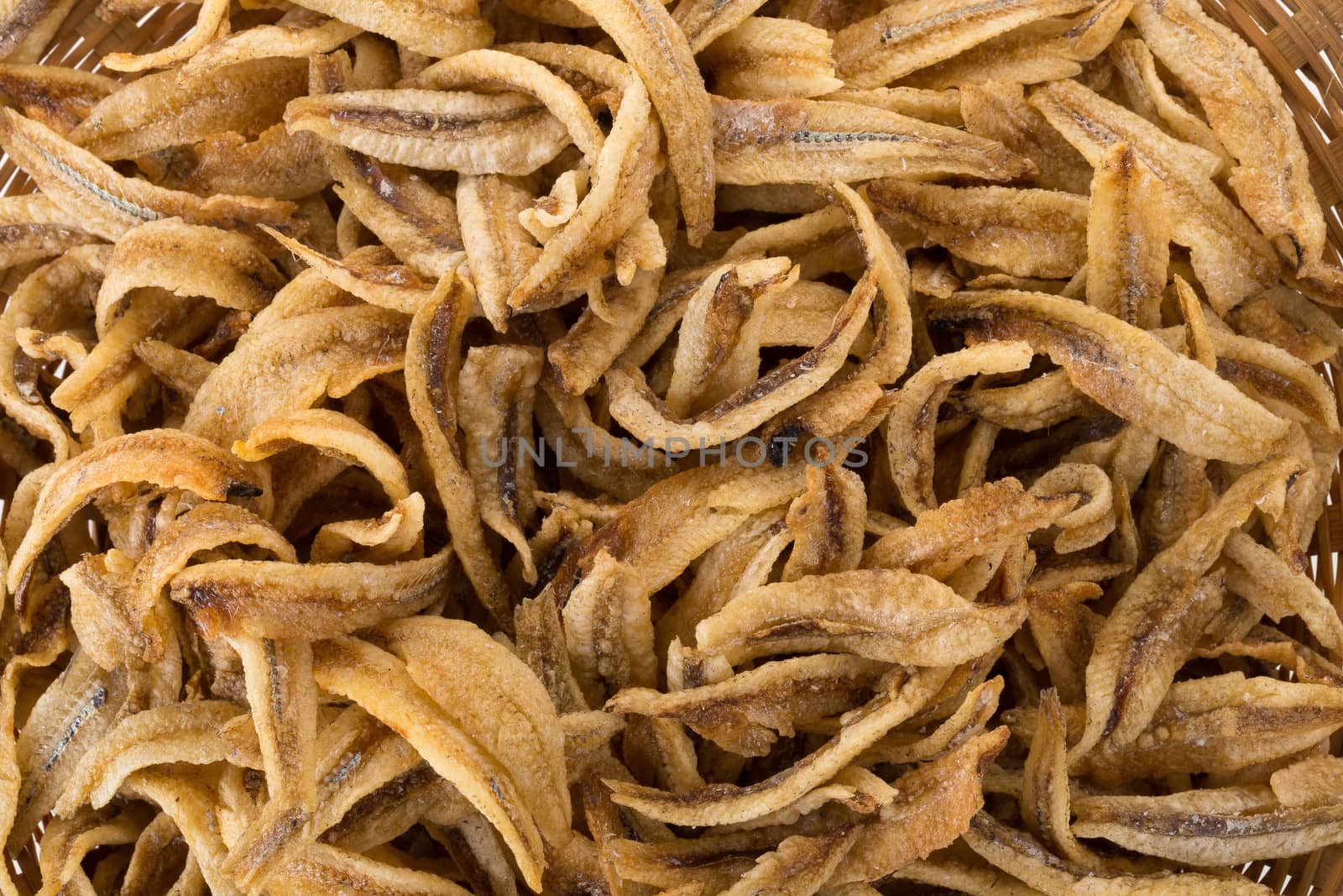Dried Small fish anchovies and crispy Seafood isolated on white  by kaiskynet