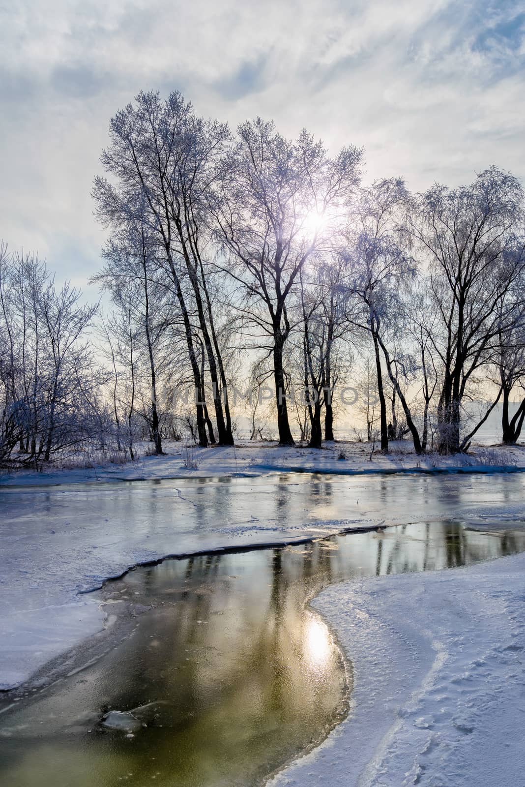 Landscape with frozen water, ice and snow on the Dnieper river in Kiev, Ukraine, during winter