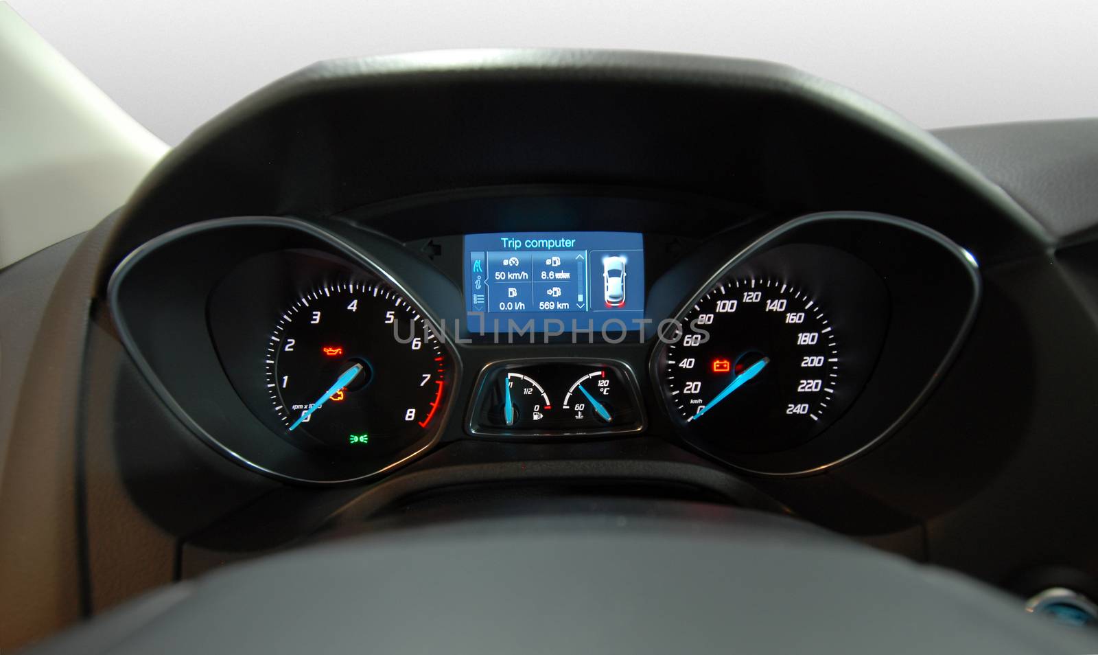 Modern car illuminated dashboard closeup