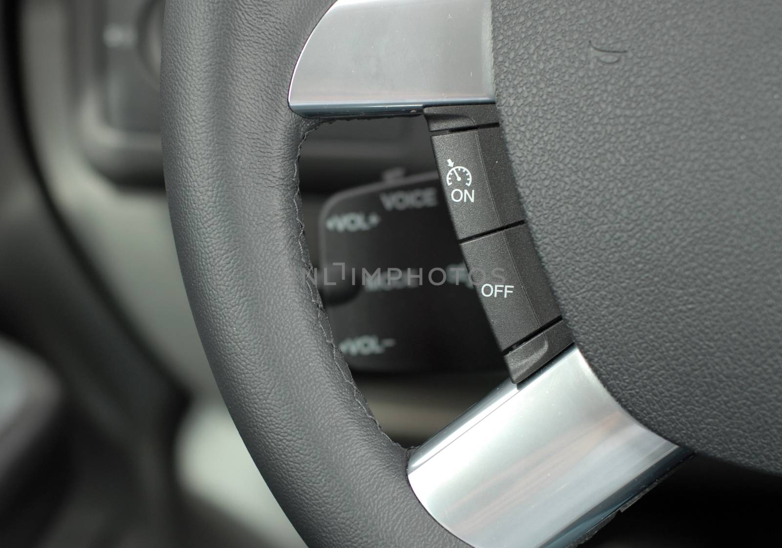 cruise control stick which is located on the wheel