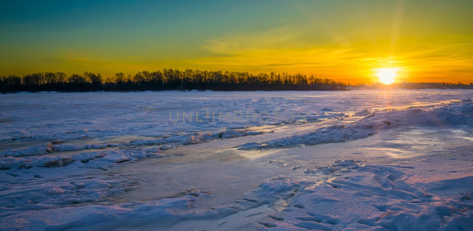 Colorful Sunrise on the Frozen River by MaxalTamor