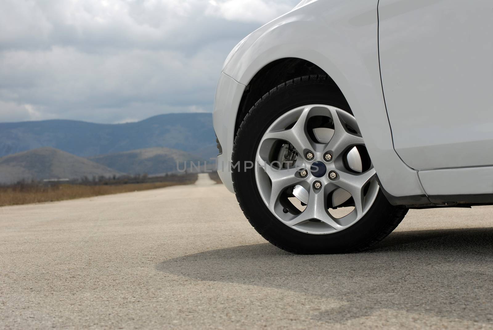 Wheel on a white sport car