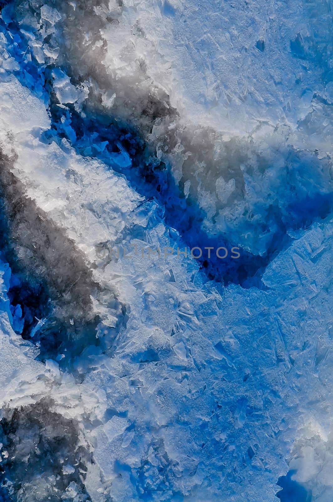 Detail of the frozen river Dnieper in Kiev capitol of Ukraine, snow, ice and water creating a nice colors effect