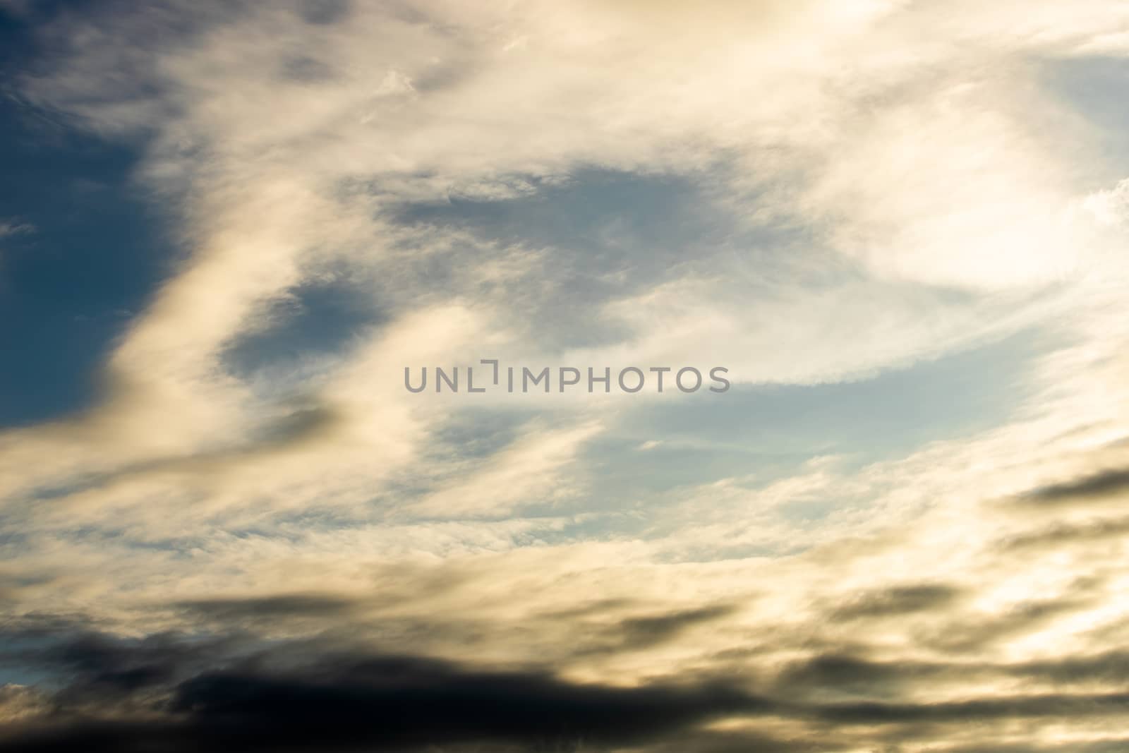 colorful dramatic sky with cloud at sunset