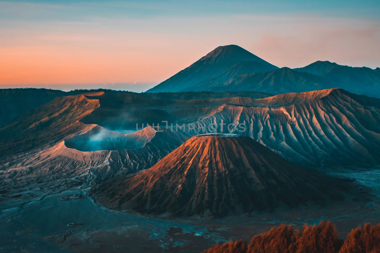 Mount Bromo volcano (Gunung Bromo) during sunrise from viewpoint on Mount Penanjakan, in East Java, Indonesia.