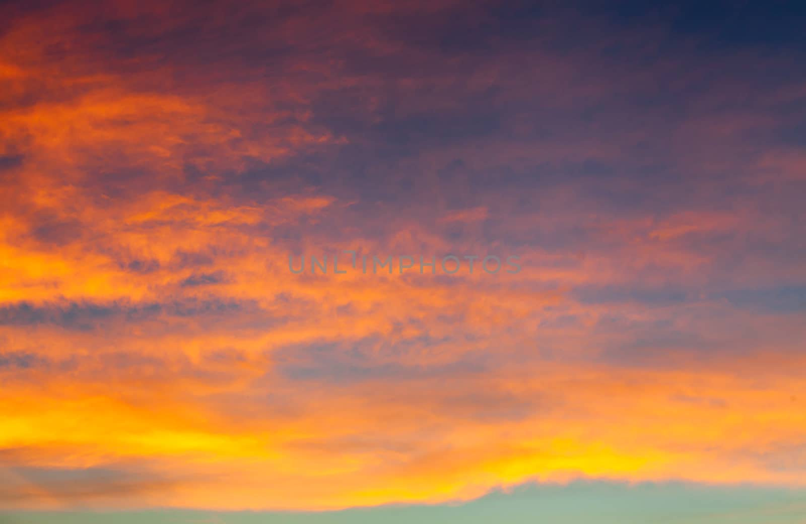 colorful dramatic sky with cloud at sunset