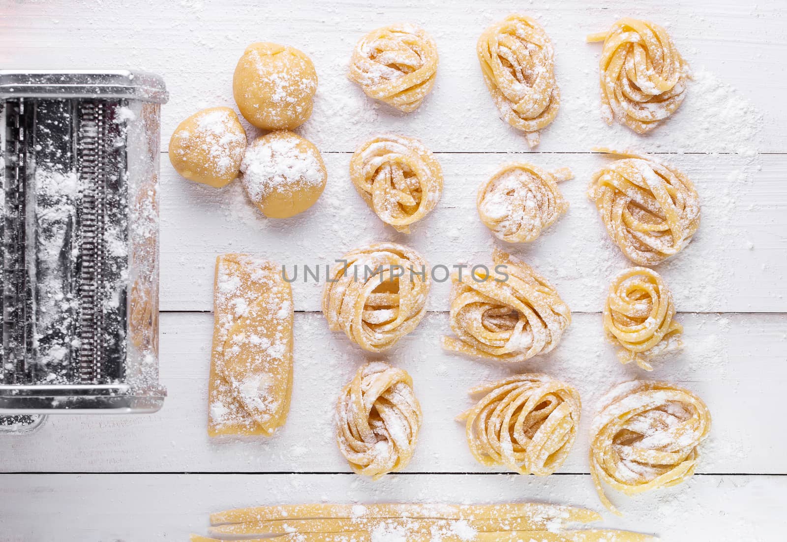 pasta with pasta ingredients on the dark wooden table top view