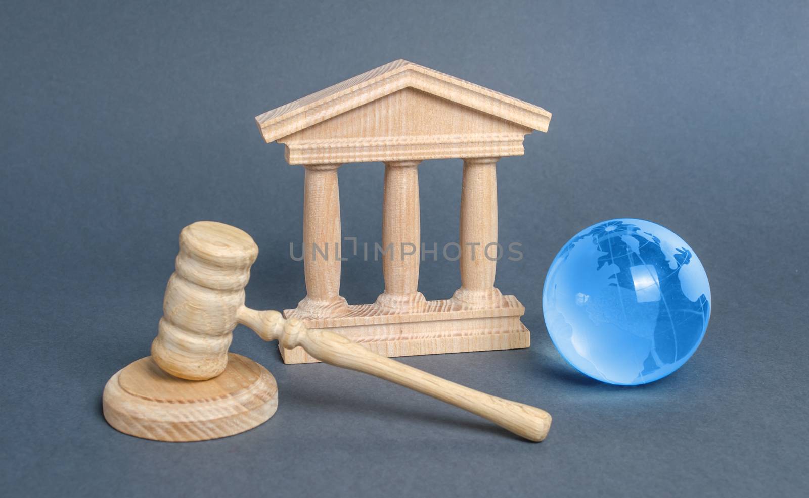Courthouse, gavel and blue globe planet earth. International Court. Protection of business interests and human rights. international conventions and treaties. supreme by iLixe48