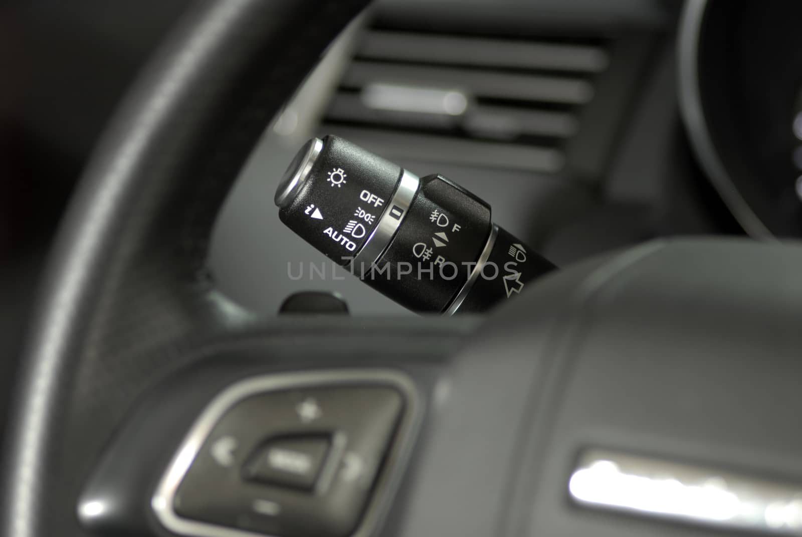 Closeup image of car lighting control switch