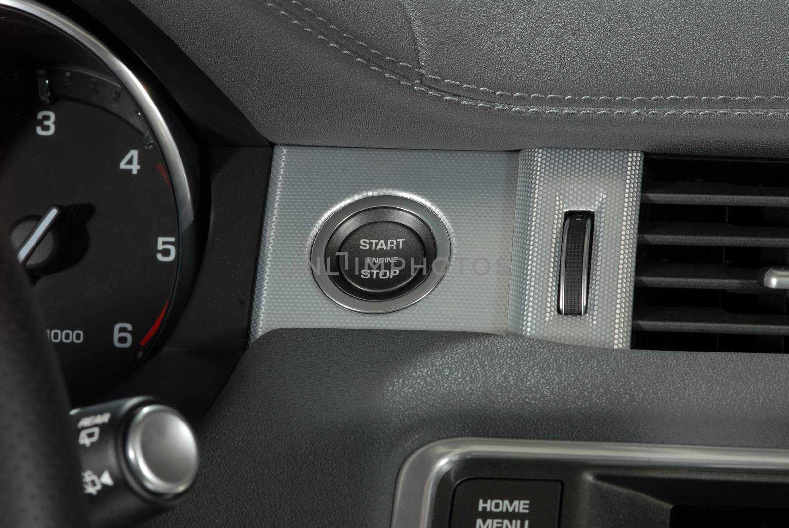 Start stop engine button on a modern car dashboard