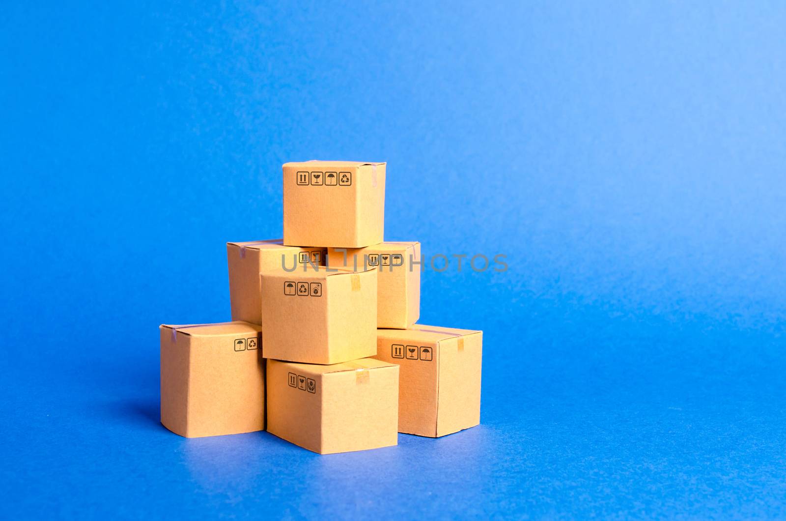 A pile of cardboard boxes. products, goods, commerce and retail. E-commerce, sale of goods through online trading platform. Freight shipping, deliver. sales of goods and services. Warehouse, stock by iLixe48