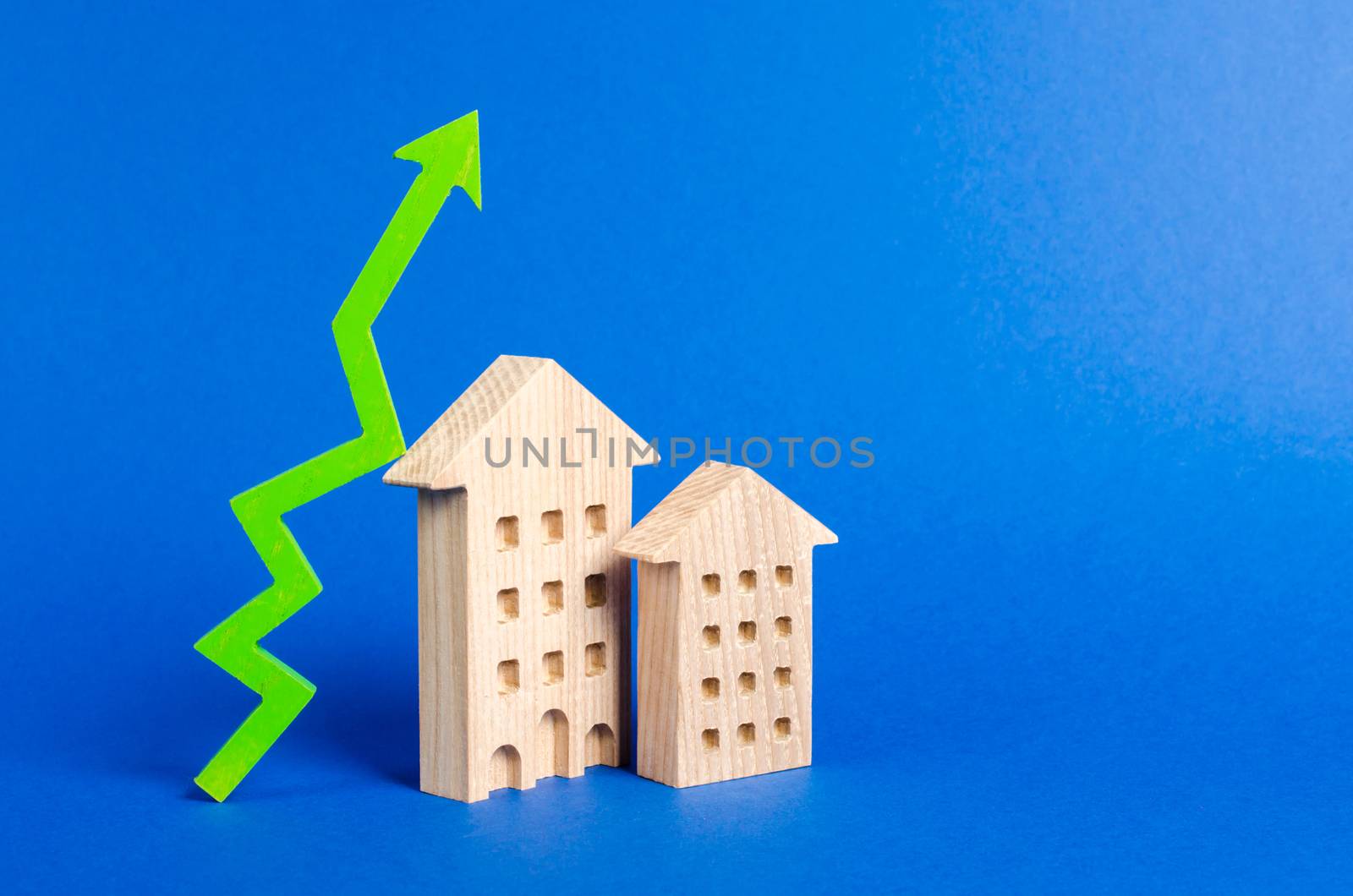 figures of residential buildings and green arrow up. Increasing cost and liquidity of real estate. Attractive investing. rising prices or renting. growth of supply and demand, high rates of sales. by iLixe48