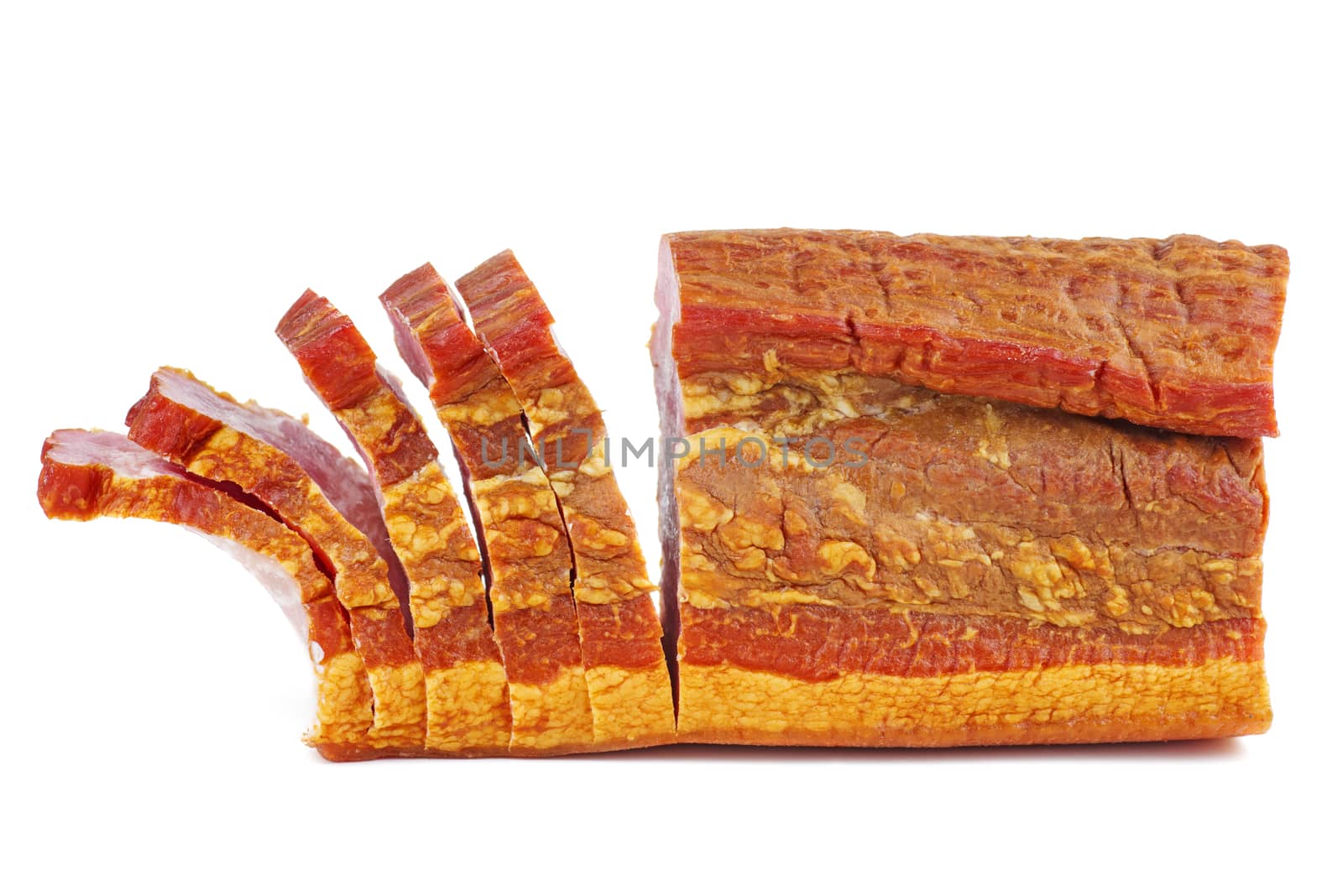 Sliced smoked ham piece isolated on white background