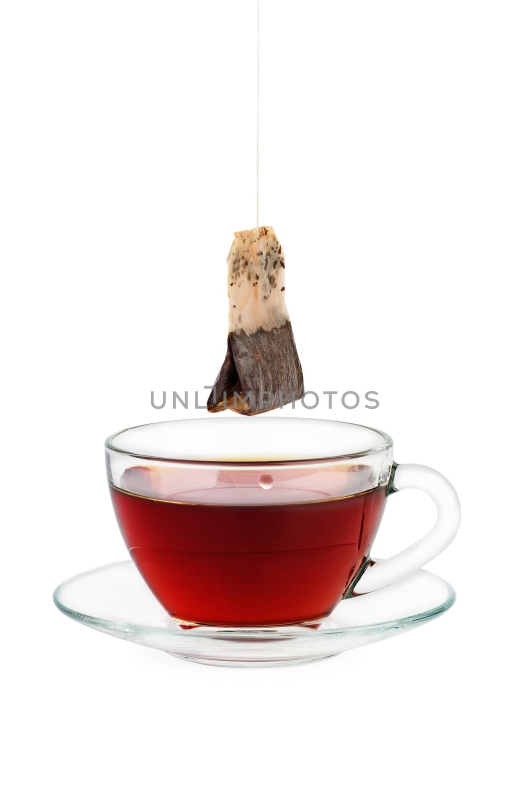 Black tea cup and teabag isolated on white background