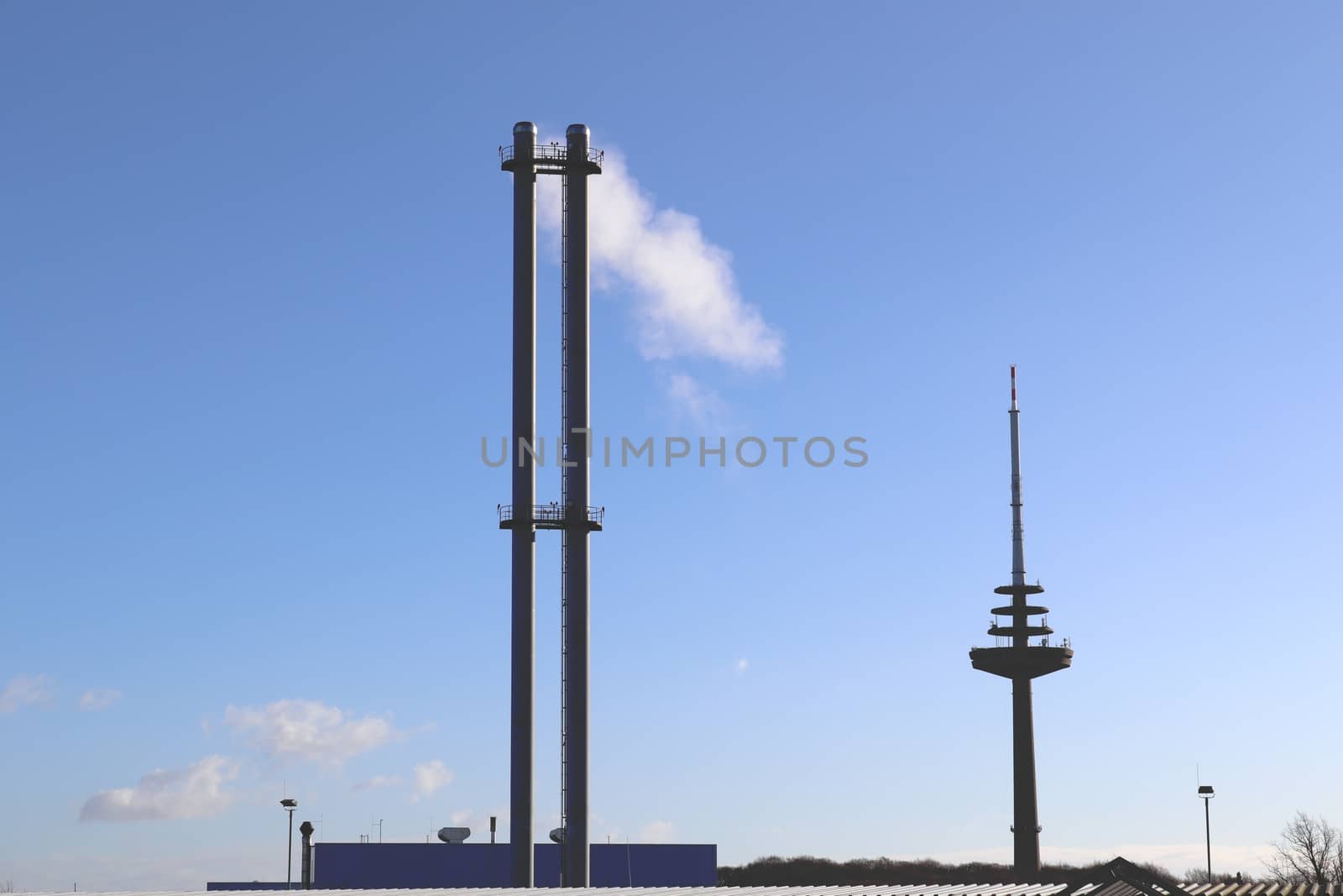 Industry pollution from factories in a blue sky