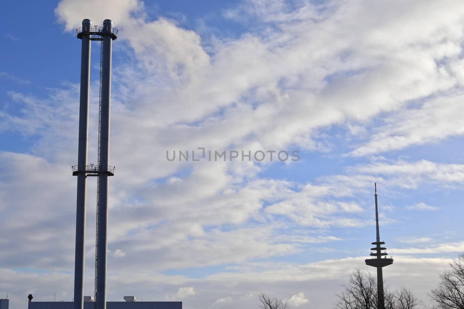 Industry pollution from factories in a blue sky