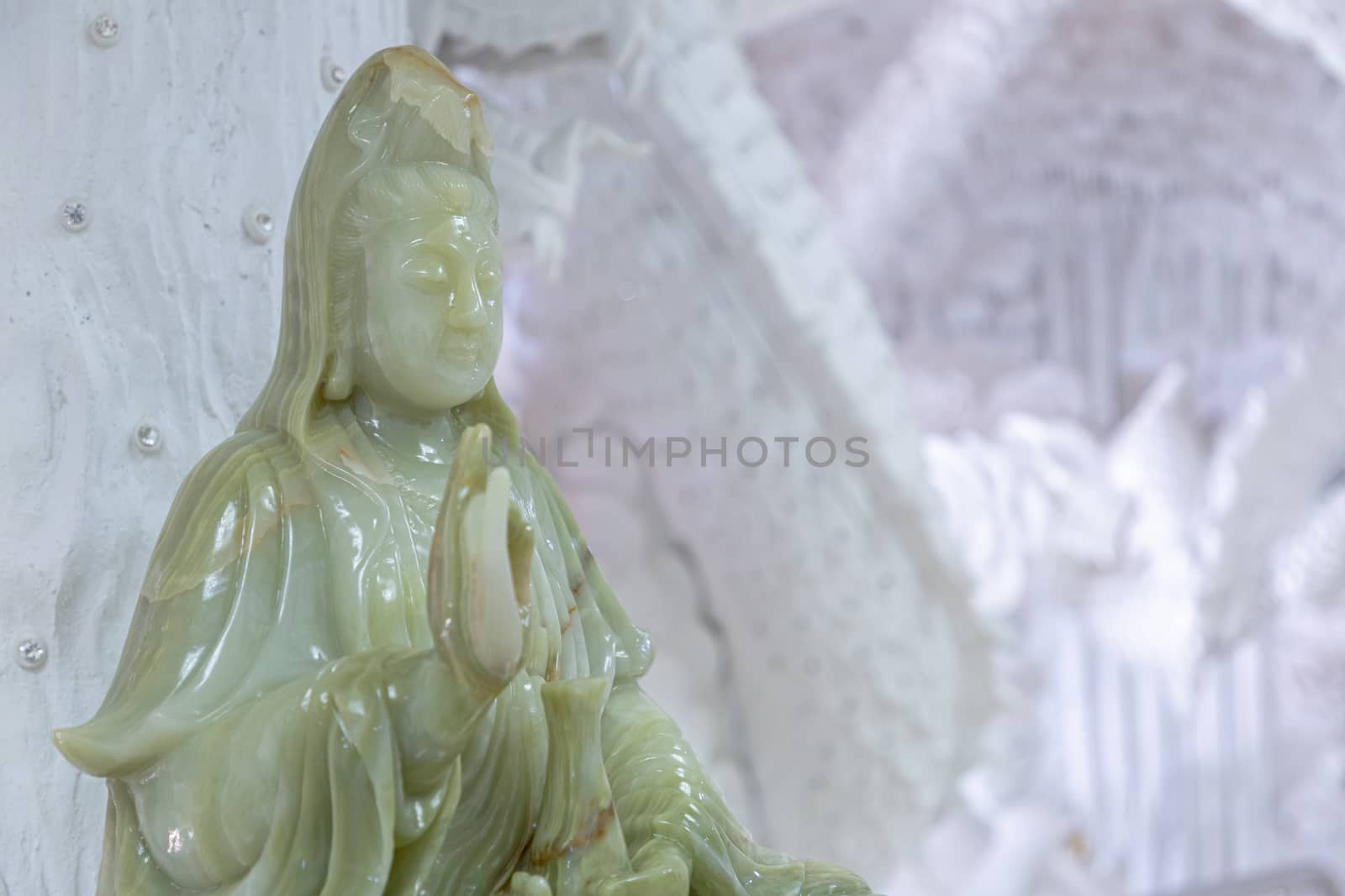Beautiful marble statue of Guan Yin at Huay Pla Kang Temple, Chiang Rai, Thailand. by phanthit