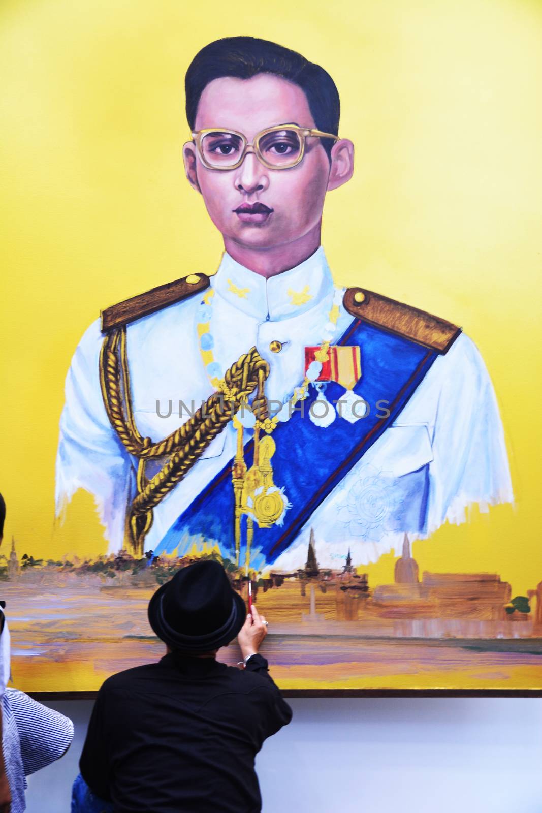 BANGKOK, THAILAND - November 12,2016 : Thai art students paint portraits of Thai King Bhumibol Adulyadej at Silpakorn University in Bangkok. King Bhumibol, the world's longest reigning monarch.