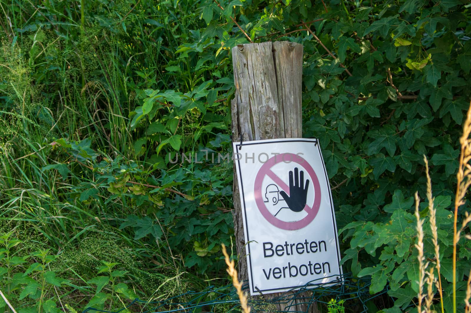 Betreten Verboten (German for "no trespassing") sign near a sandpit