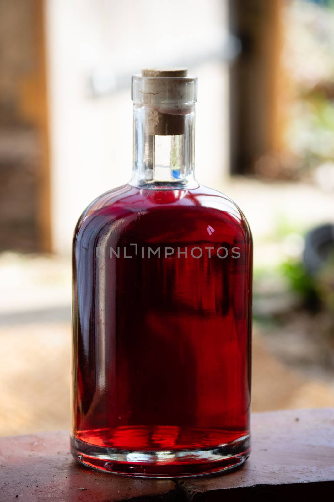 homemade bottle of red wine