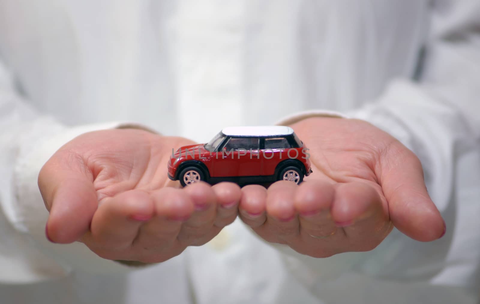 the car is in woman's hands, car protection