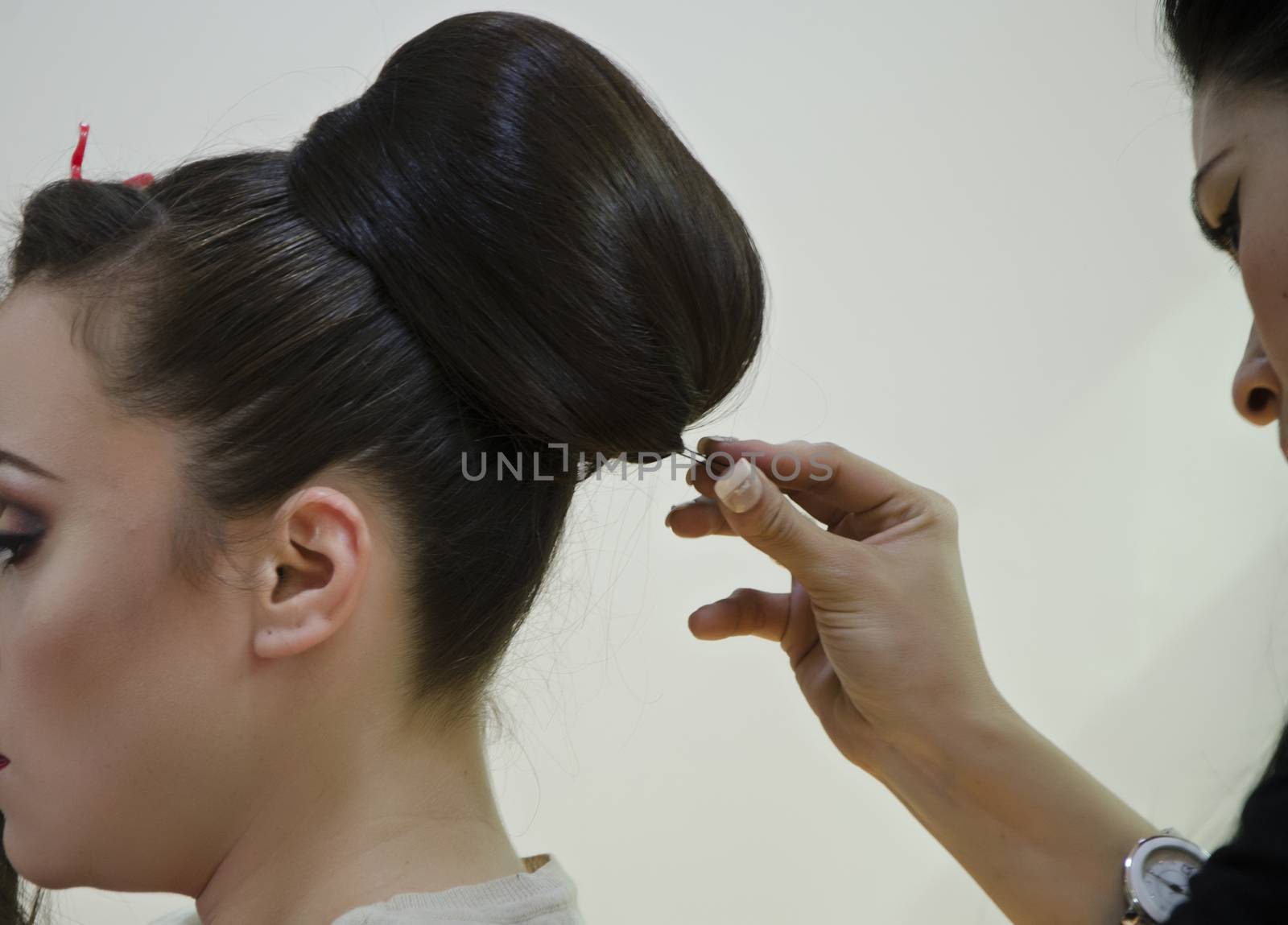 Woman in a hairdresser doing a hairstyle