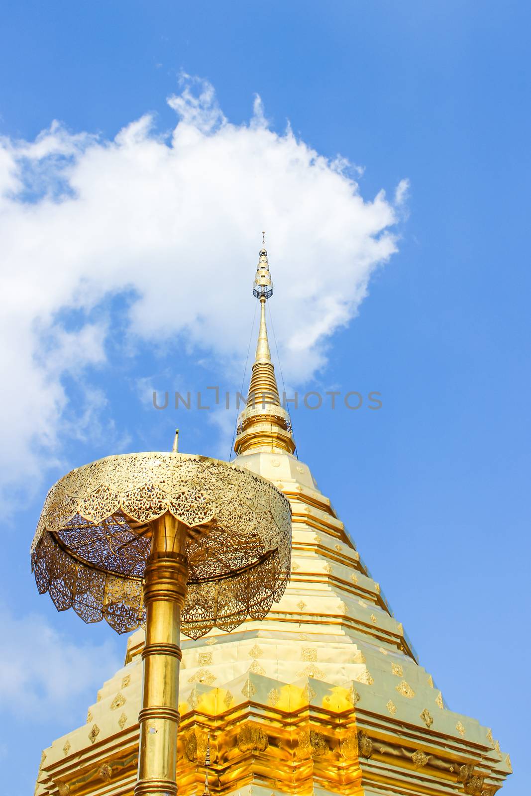 Golden pagoda and umbrella in Wat Phra That Doi Suthep is the popular tourist destination of Chiang Mai, Thailand.