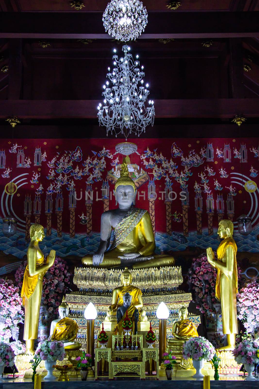 AYUTTHAYA, THAILAND - SEPTEMBER 9, 2018 : Buddha statues and murals inside Wat Yai Chaimongkol famous and popular tourist destinations Ayutthaya, Thailand. by prapstock