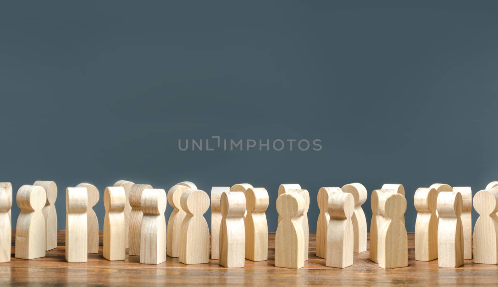 A crowd of wooden figures of people. society, demography. group of citizens, rally, political movement or electorate. Customers and buyers, statistics, preferences of Population. Employees. Copy space by iLixe48