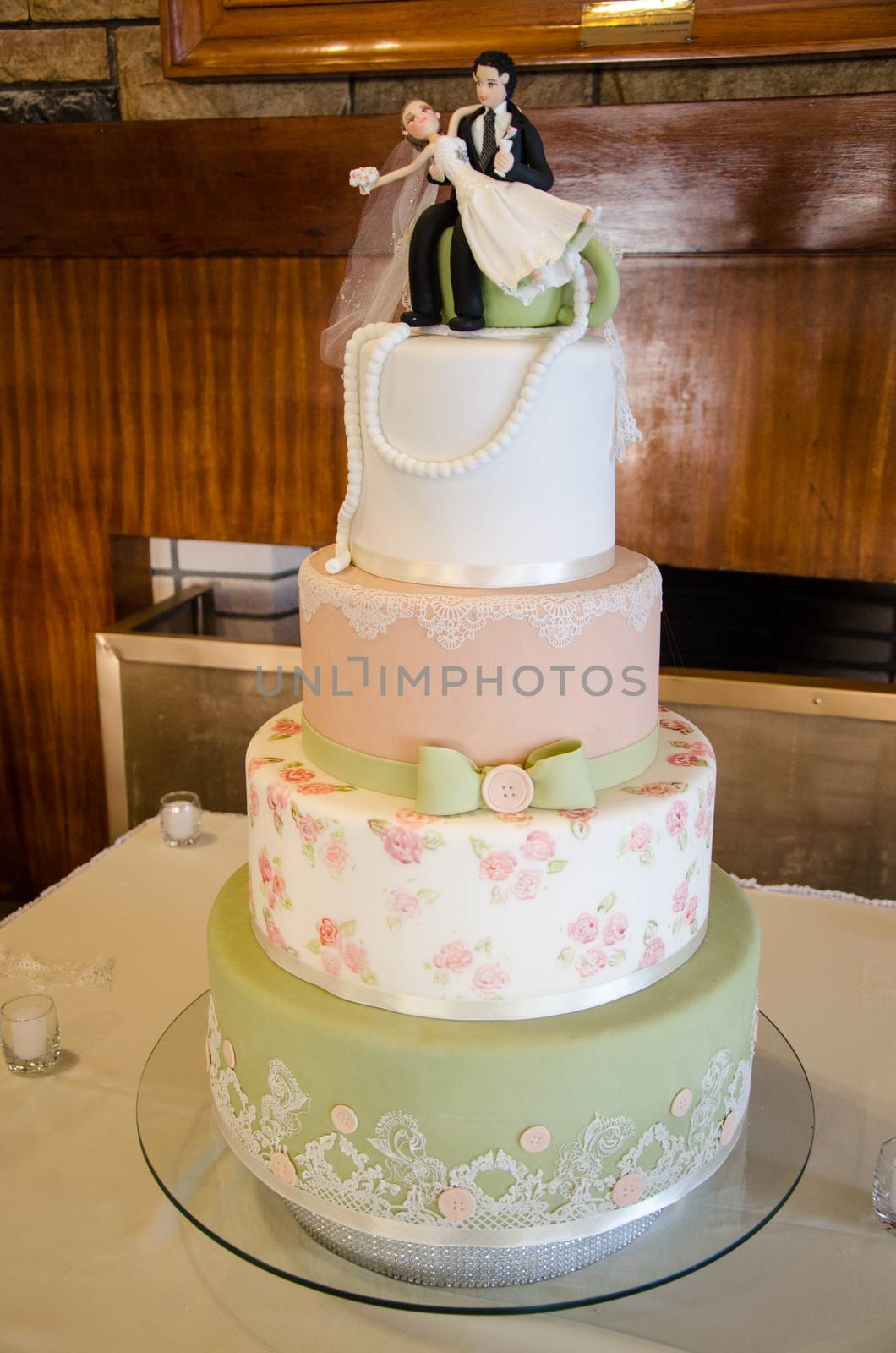 Decorating a cake at a wedding