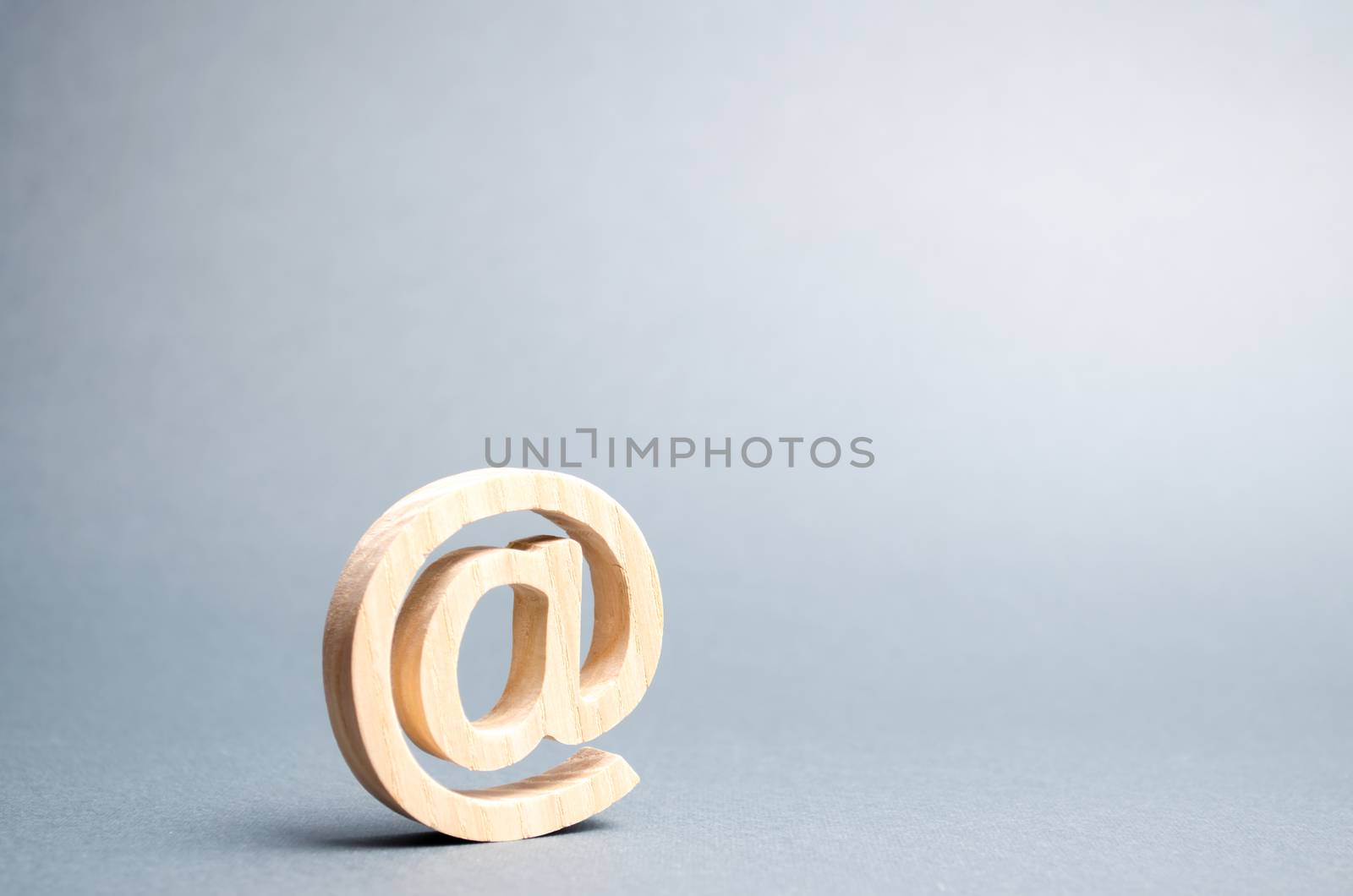 Email icon on gray background. internet correspondence, communication on the Internet. Contacts for business. Establishing contacts with customers. Digital economy, online services. Selective focus by iLixe48