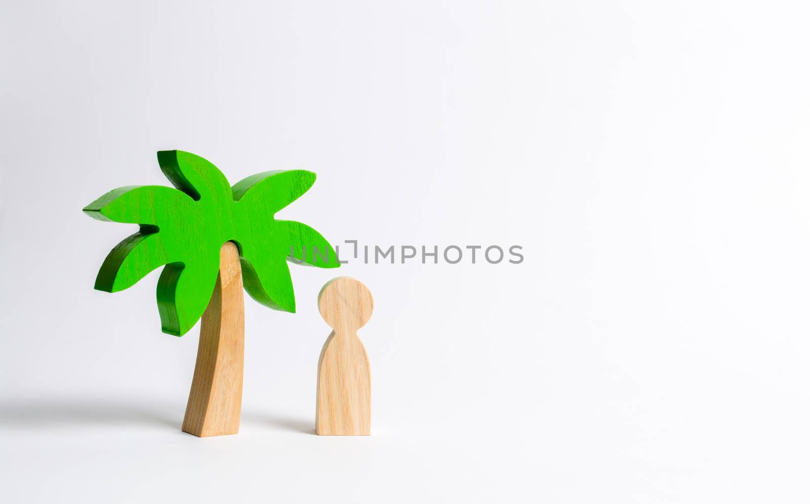 The figure of the person costs under a wooden palm tree on a white background. Vacation or trip. Stuck on a desert island. Personal space and moral rest. Harmony, balance in life, psychological health by iLixe48