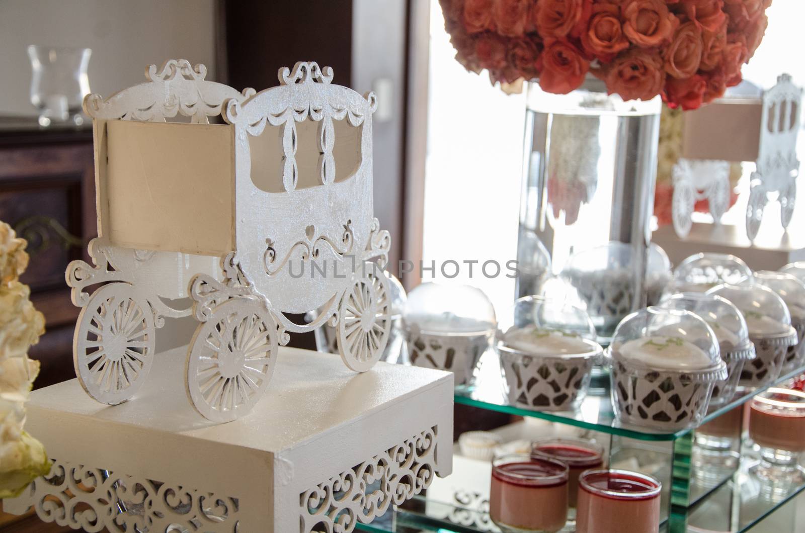 Decorating a candy table at a wedding